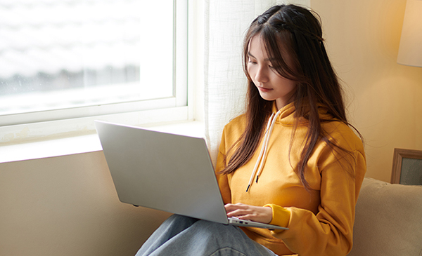 Young Woman Using Computer