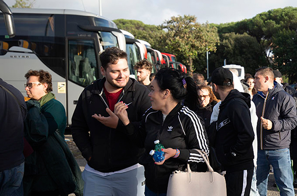 Patrons Exiting Bus to Attend God Loves You Tour Festival