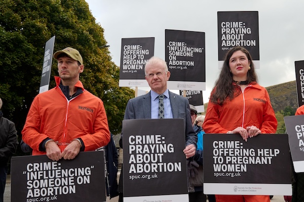 Scottish Citizens with Protest Signs