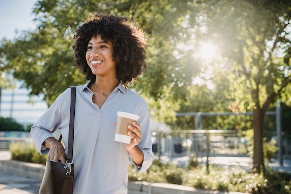 Woman Enjoying a Cup of Coffee