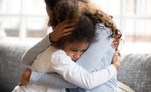 Mother and Daughter Hugging