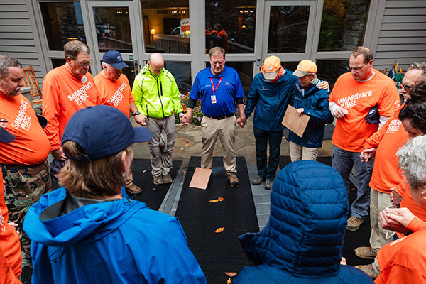 Billy Graham Chaplain and Volunteers Gathered in Prayer at the Cove