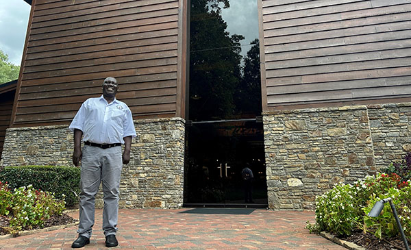 Man from Uganda Standing Outside Billy Graham Library Entrance