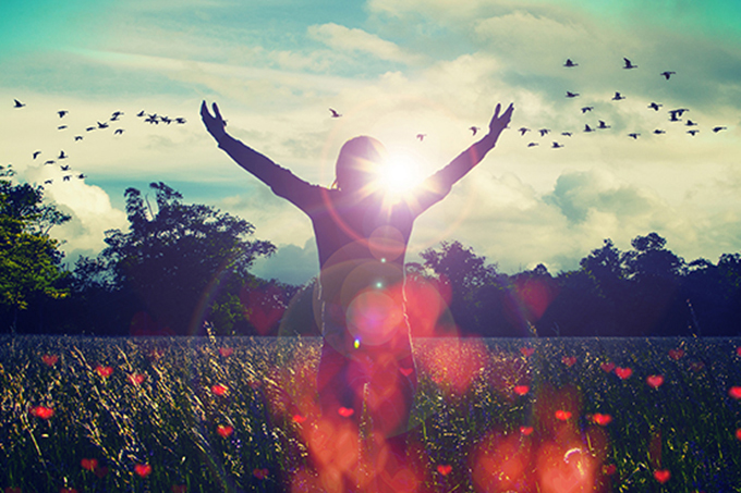 Person Rejoicing in Open Field