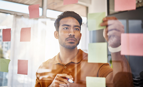 Man Working on Vision Board