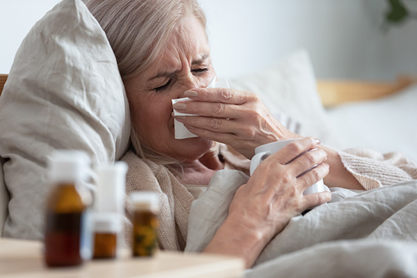 Woman Blowing Her Nose