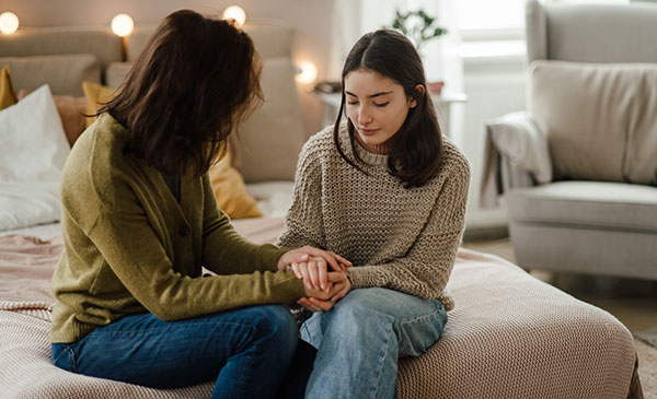 Mom and Daughter Praying