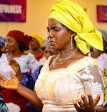 Nigerian Woman Worshiping