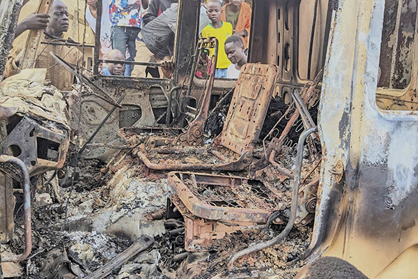 Burned Vehicle Wreckage in Congo