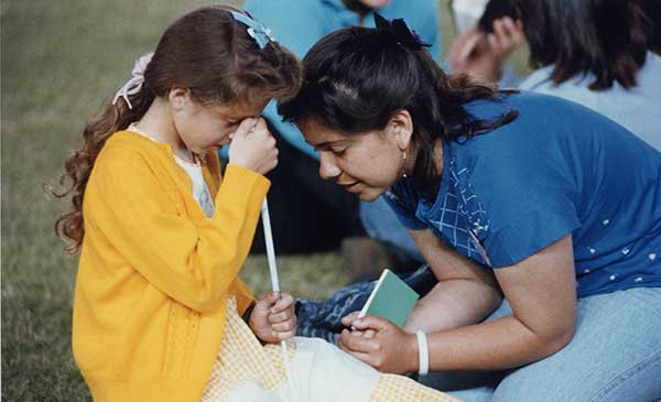 Spanish Speaker Praying with Child