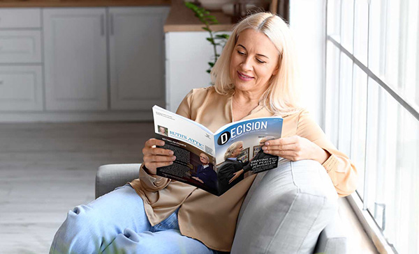 Woman Reading Decision Magazine